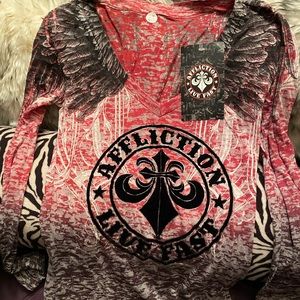Long sleeve affliction burnout tee. Wing details on back. Pink, grey, and black